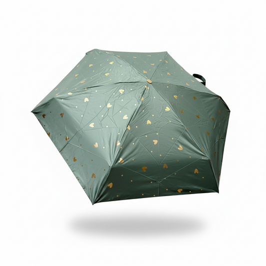Green umbrella with gold heart patterns on a white background