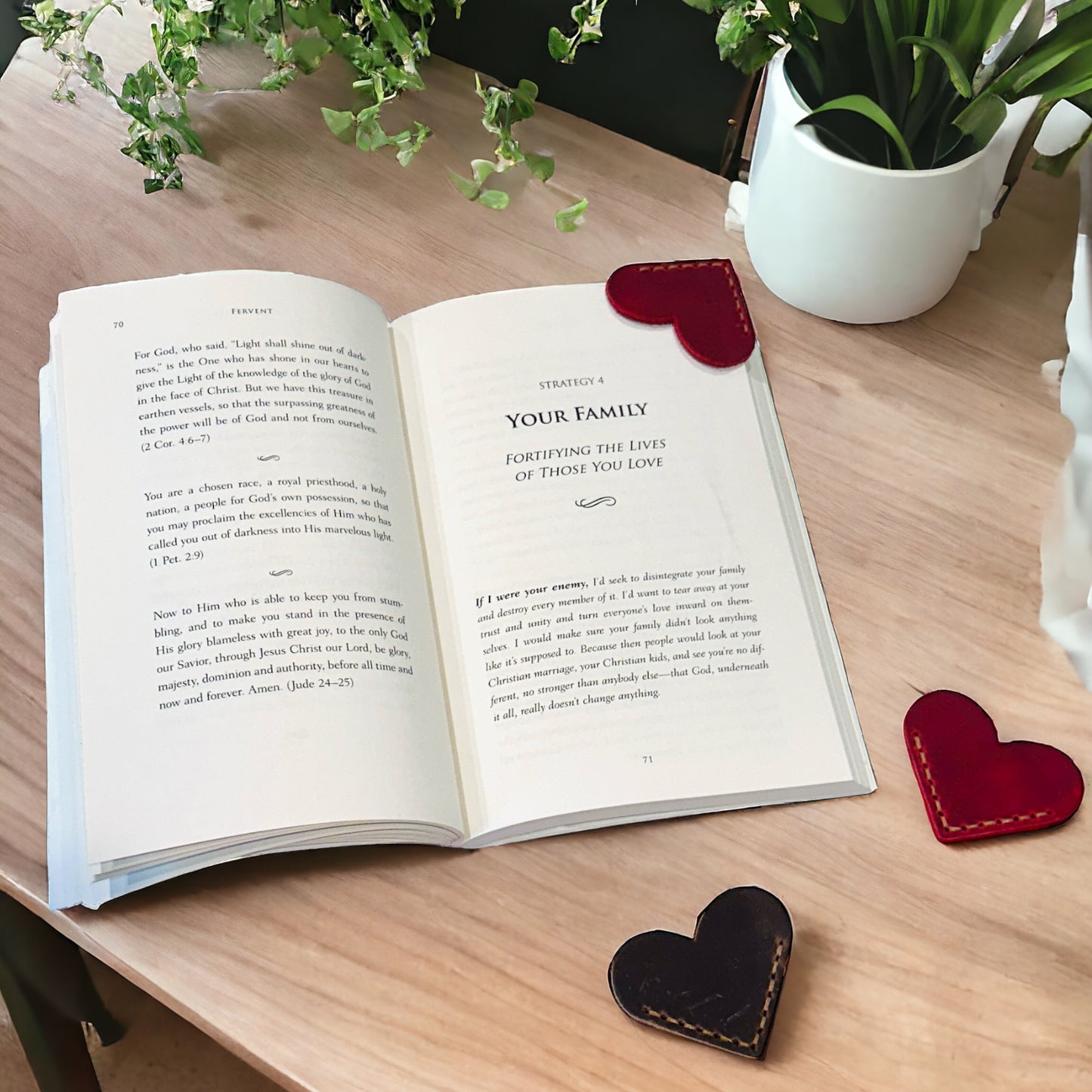 Stitched heart shaped leather bookmark for corner of pages in red and brown. 